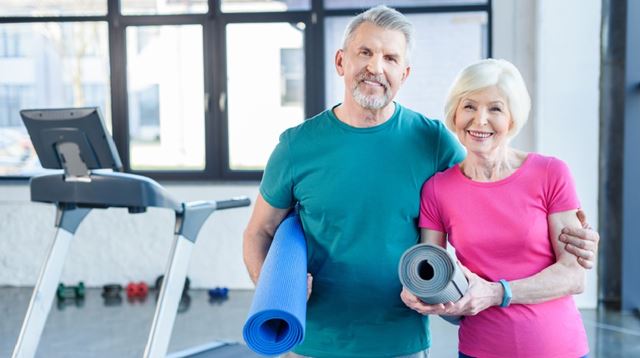 Joining a gym senior couple gym